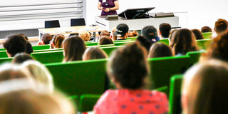 Students sitting in a lecture at the beginning of the study.